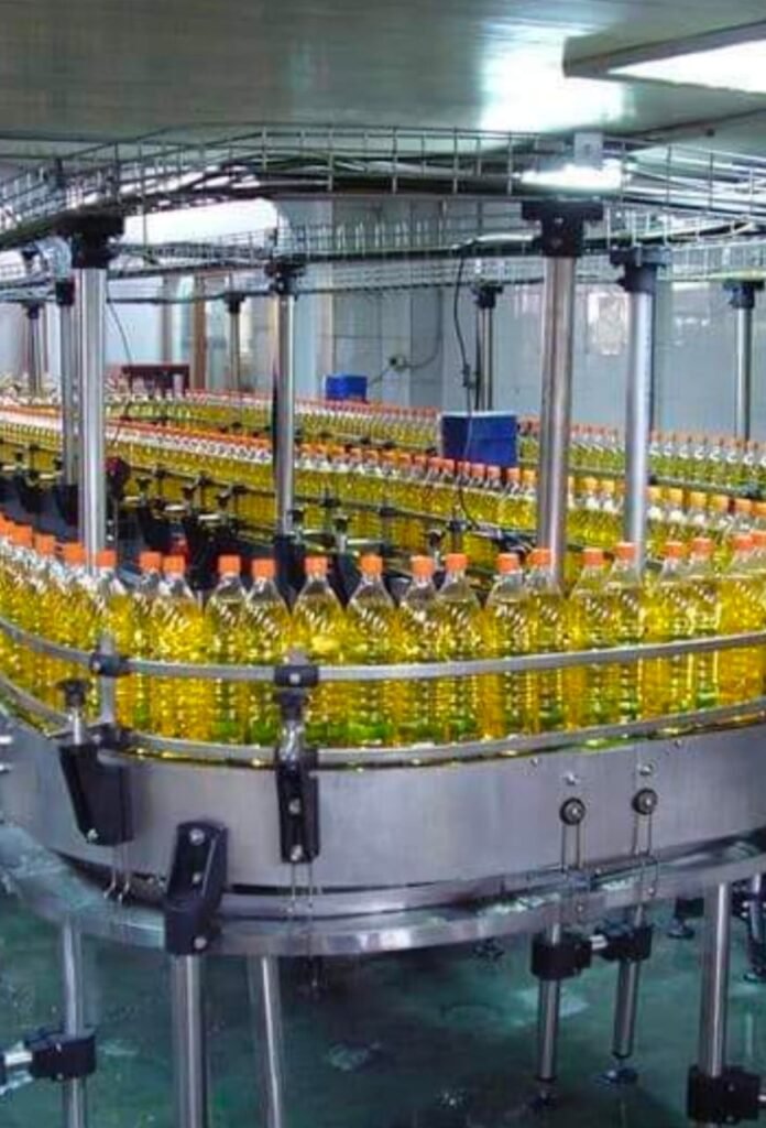 Palm Based Products & Cooking Oils 1 litre bottles in factory machine
